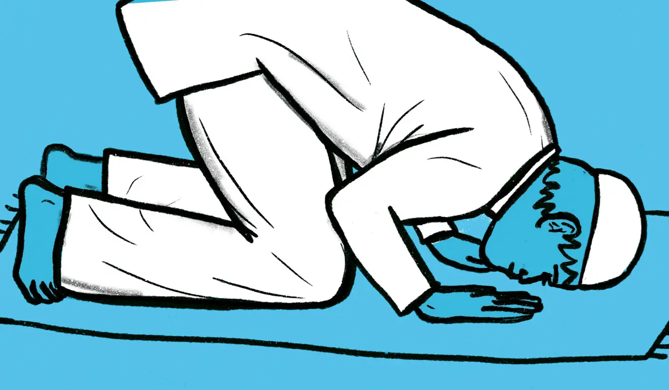 Man in Sajdah position with his head on the ground and his palms on either side of his head on the ground.