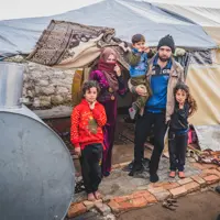 Displaced families in flimsy shelters facing sub-zero temperatures
