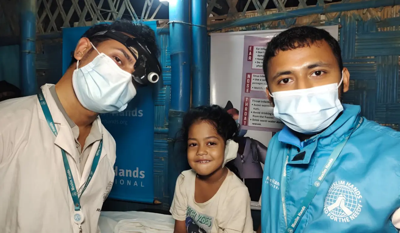 A young Rohingya refugee child receives specialist medical treatment at a Muslim Hands health post