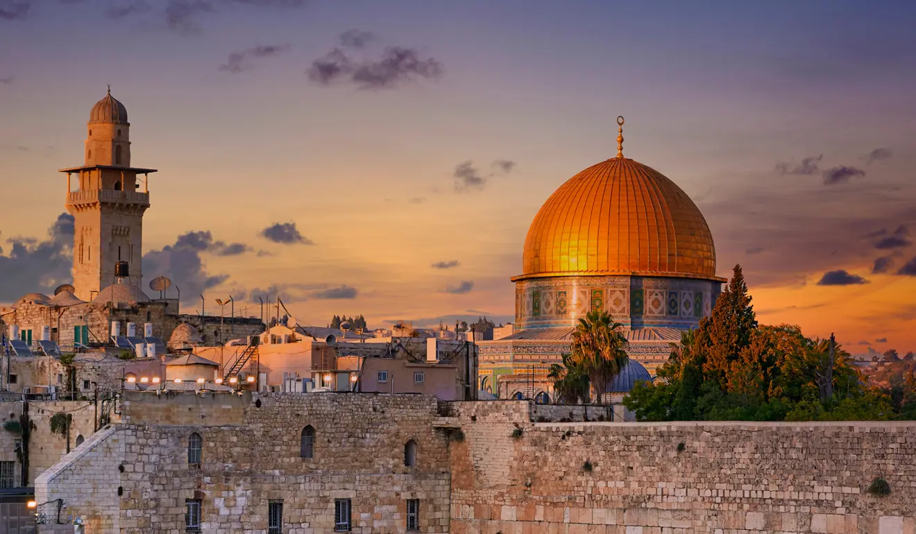 A view of Masjid Al-Aqsa and Jerusalem at sunset